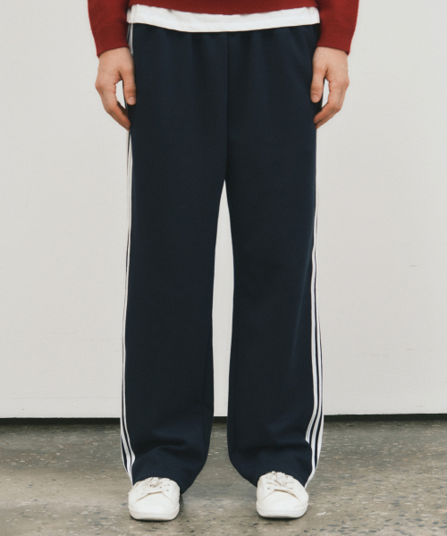 WEDNESDAY OASIS（ウェンズデーオアシス）の「ニュートロライントラックパンツ_NAVY(W25-PT25)（スウェットパンツ・メンズ・ネイビー・MEDIUM/LARGE）」の4枚目の写真