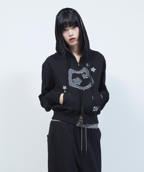 LMR(エルエムアール)の「キャットシンボルパッチワーククロップフードジップアップBLACK(パーカー・レディース・ブラック・LARGE/SMALL/MEDIUM)」の1枚目の写真