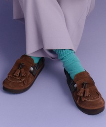SHAKA（シャカ）の「SHAKA MOC MULE TASSEL SUEDE モック ミュール タッセル スエード（サンダル）」