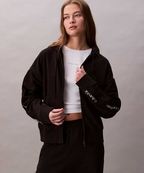 ロゴテープテリー ジップアップフーディー（パーカー）｜Calvin Klein