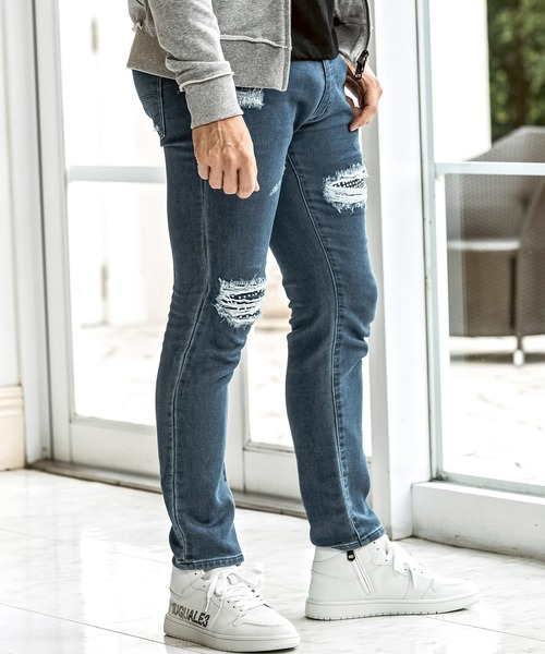 1PIU1UGUALE3  RELAX （ウノピゥウノウグァーレトレ リラックス）の「1PIU1UGUALE3 RELAX(ウノピゥウノウグァーレトレ リラックス)ラインストーン ダメージジョグデニムパンツ（デニムパンツ・メンズ・ホワイト/ブラック/インディゴブルー・S/M/L/XL/XXL）」の12枚目の写真