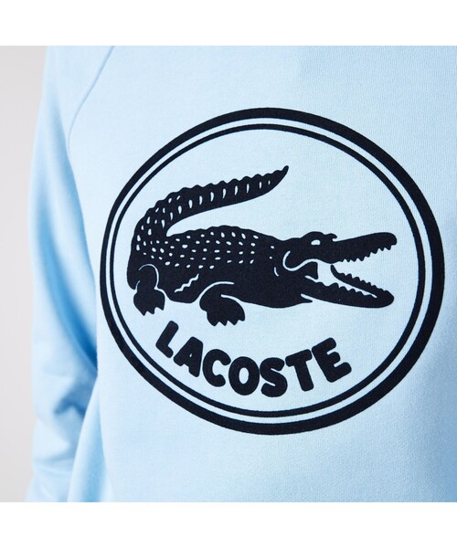 LACOSTE（ラコステ）の「フロッキークロックプリントスウェット