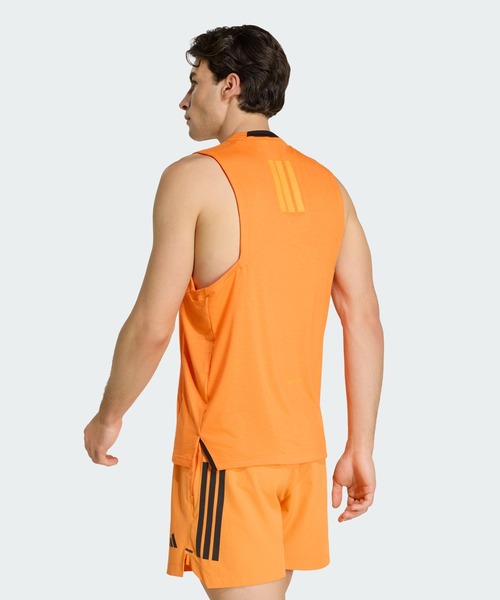 adidas(アディダス)の「Les Mills グラフィック タンクトップ / アディダス adidas(Tシャツ/カットソー・メンズ・オレンジ・XX-LARGE/XX-SMALL/3XL/LARGE/MEDIUM/SMALL/X-LARGE/X-SMALL)」の2枚目の写真