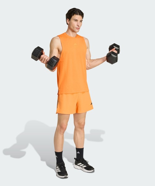 adidas(アディダス)の「Les Mills グラフィック タンクトップ / アディダス adidas(Tシャツ/カットソー・メンズ・オレンジ・XX-LARGE/XX-SMALL/3XL/LARGE/MEDIUM/SMALL/X-LARGE/X-SMALL)」の3枚目の写真