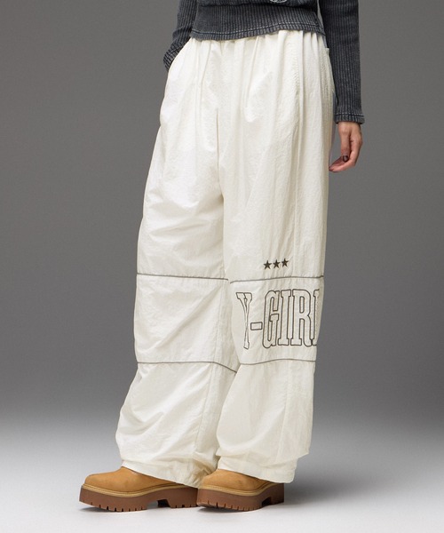 X-girl(エックスガール)の「LOGO AND STAR WIDE LEG TRACK PANTS(その他パンツ・レディース・ブラック/オフホワイト・M/S)」の2枚目の写真