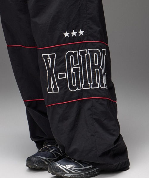 X-girl(エックスガール)の「LOGO AND STAR WIDE LEG TRACK PANTS(その他パンツ・レディース・ブラック/オフホワイト・M/S)」の6枚目の写真