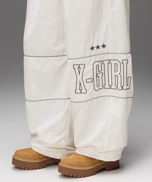 X-girl(エックスガール)の「LOGO AND STAR WIDE LEG TRACK PANTS(その他パンツ・レディース・ブラック/オフホワイト・M/S)」の10枚目の写真
