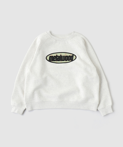 WISM(ウィズム)の「Metalwood Studio / メタルウッド スタジオ PLAID OVAL LOGO RAGLAN C/N SWE(スウェット・メンズ・ライトグレー・MEDIUM/LARGE)」の1枚目の写真