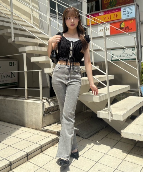 continuer de NICE CLAUP(コンティニューデナイスクラップ)の「バックリボンレースフレアーパンツ(その他パンツ・レディース・スミクロ/その他/ケミカルウォッシュ・SMALL/MEDIUM)」の13枚目の写真