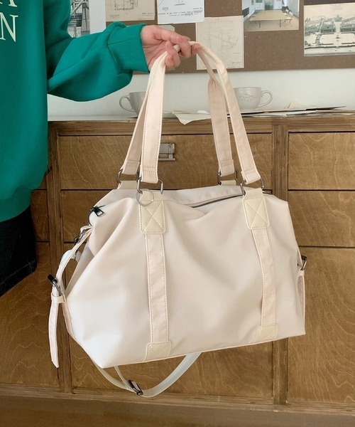 yuue' ( wear )(ユーイ)の「2WAY大容量ナイロントートバッグ/ママバッグ/旅行バッグ/A4サイズ対応(ショルダーバッグ・レディース・ブラック/アイボリー・FREE)」の1枚目の写真