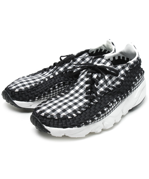 NIKE(ナイキ)の「FOOTSCAPE WOVEN FREEMOTION(スニーカー・メンズ・ブラック/ブルー/レッド・24/26/26.5/27/27.5/28/28.5)」の1枚目の写真