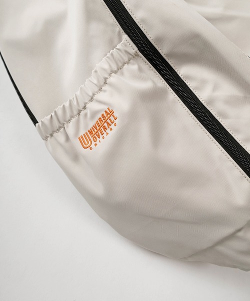 UNIVERSAL OVERALL(ユニバーサルオーバーオール)の「【94】【UNIVERSAL OVERALL/ユニバーサルオーバーオール】ワンポイントロゴ刺繍 おにぎり型ワンショルダーバッグ/15L(ショルダーバッグ・メンズ・ネイビー/オフホワイト/カーキ/ブラック・FREE)」の9枚目の写真