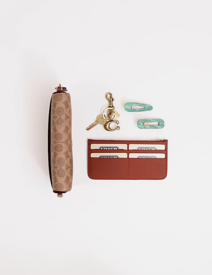 ミラ クロスボディ バッグ・シグネチャー キャンバス（ショルダー