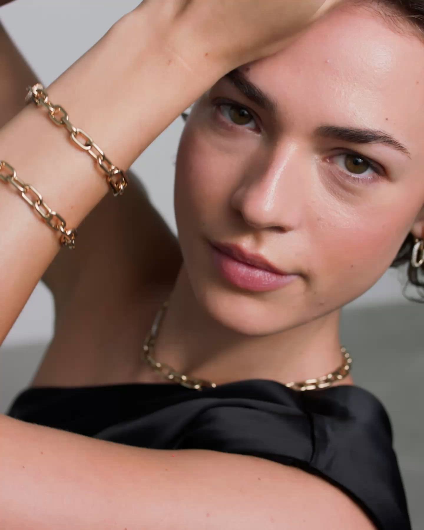 CRYSTAL LINK BRACELET レディースブレスレット ゴールド／ローズ